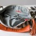 Kallia in Striped canvas and Orange leather details