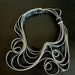 The Tangled Metal Zipper Necklace