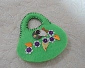 Hand made, embroidered green felt needlecase or pin cushion
