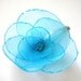 aqua poppy flower snap clip