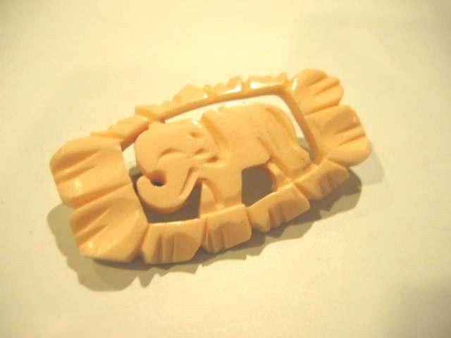 Vintage Elephant pin.  Brooch.  Faux Ivory
