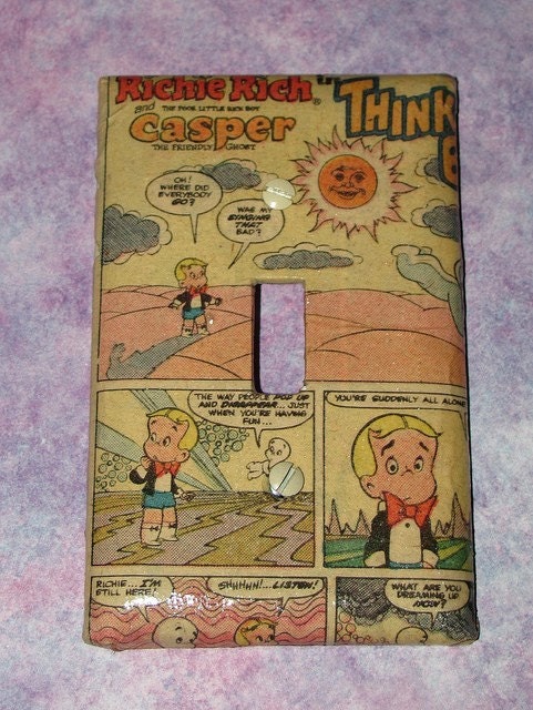 repurposed richie rich and casper comic book page, made into a light switch cover
