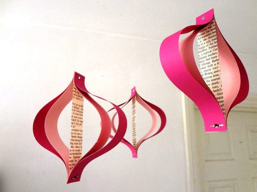 Valentines Day paper decorations, recycled romance novels, retro geometric curves, pink white