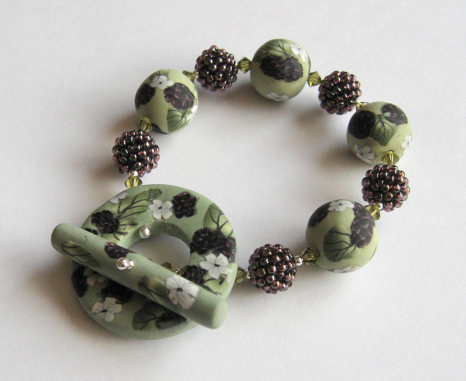 Hedgerow - bracelet with polymer clay beads, beaded beads and crystals