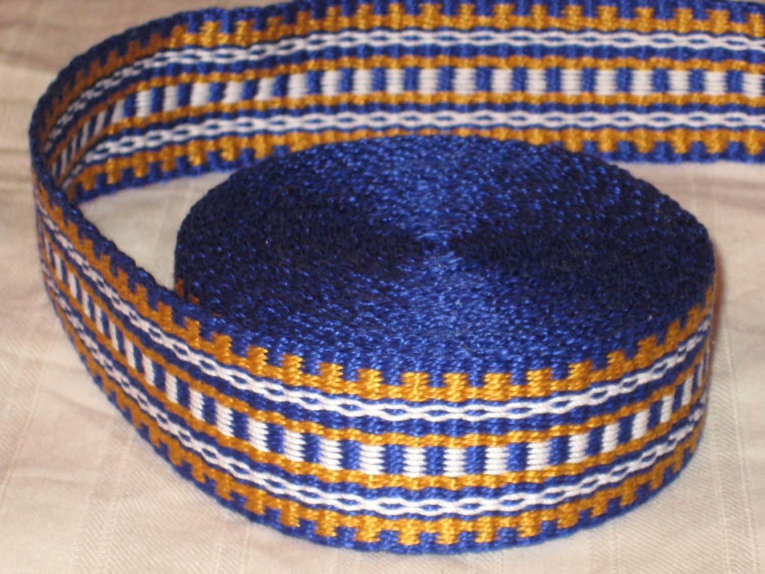 White, royal blue, and gold hand-woven inkle trim (over 14 feet)