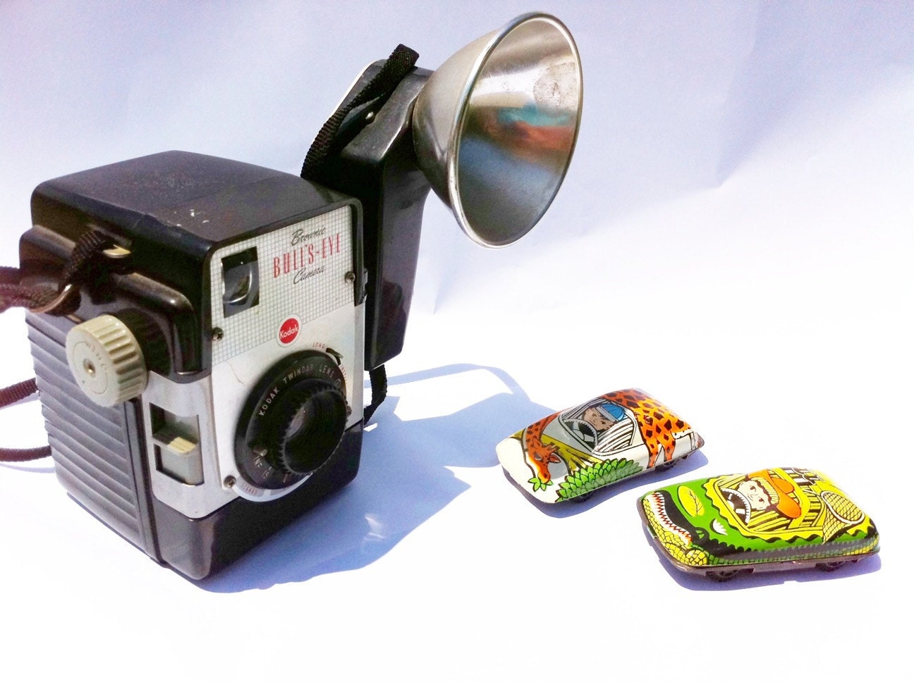 Brownie Bull's Eye vintage camera.  1950s.  Bakelite.  Kodak camera with flash and strap.