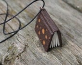 Space nomad I  - miniature book necklace