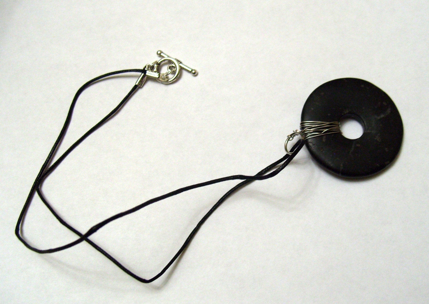 Black Donut Pendant Necklace