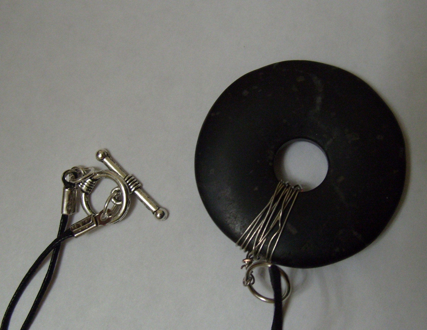Black Donut Pendant Necklace