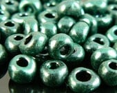 Size 8/0 metallic finish opaque green seed beads, 20 grams (approx. 1000 beads)