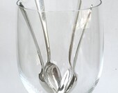 please pass me a  spoon  ... 4  vintage silver spoons