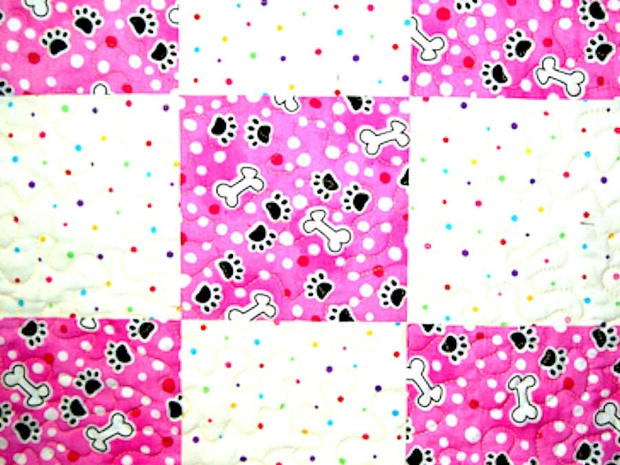 Paw Prints pink and white quilt