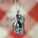 Cupcake Pan and Tiny Measuring Spoons on a Sterling Silver Plated Chain necklace