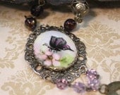 Altered Necklace featuring Hand Painted Butterfly & Rose on Porcelain