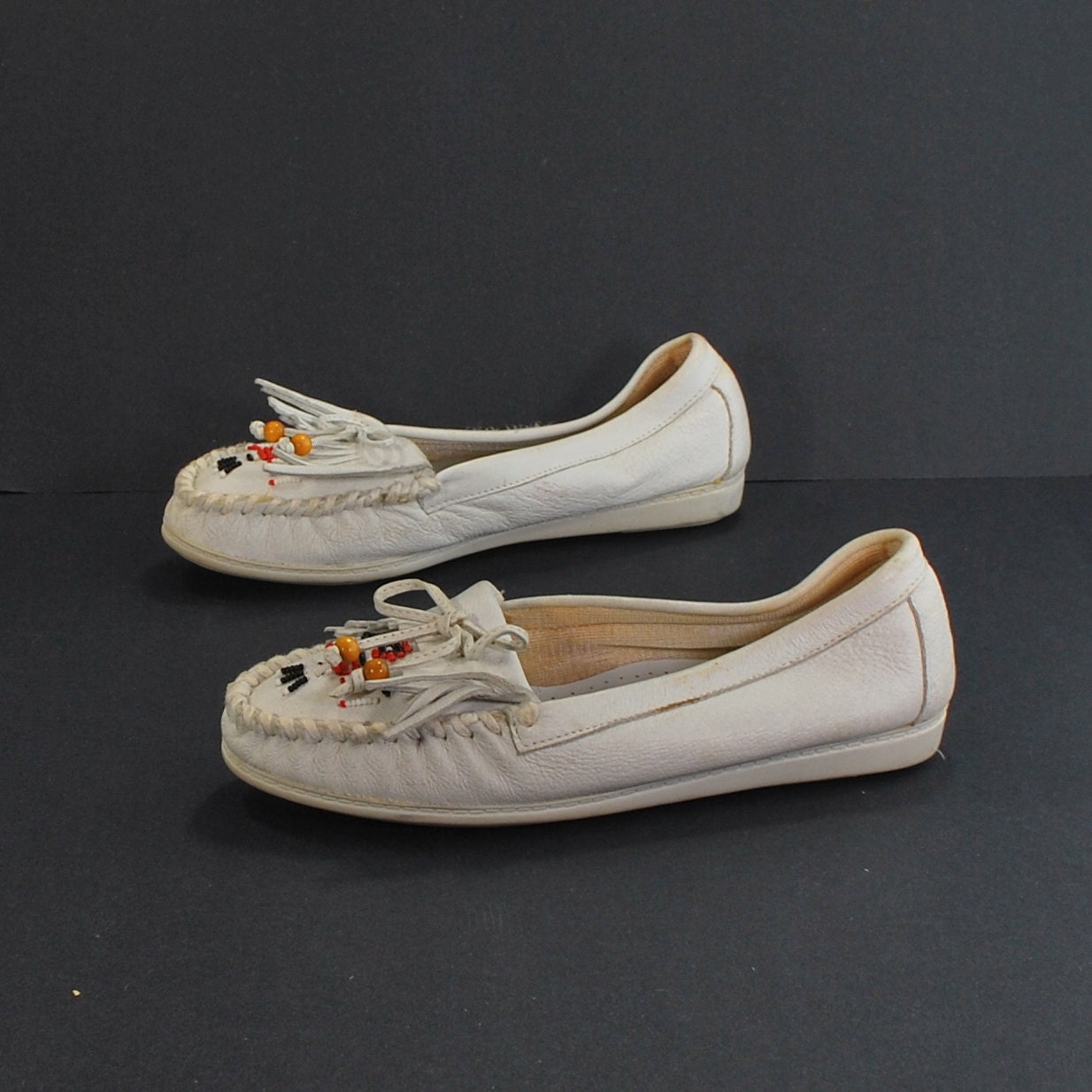 The Tribal Granny .white leather vintage moccasins .rubber soles .boat shoe style .fringe kiltie -womens size 5.5-
