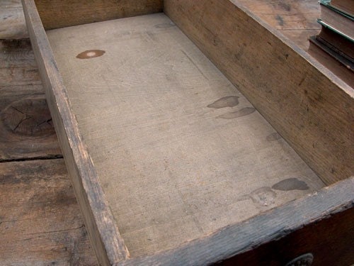 Salvaged old drawer for storage