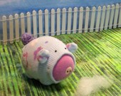 Sock Piggy likes to help in the Garden