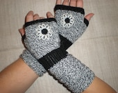 Hand-knitted white/black acrylic wrist warmers with hand needlecrafted flower
