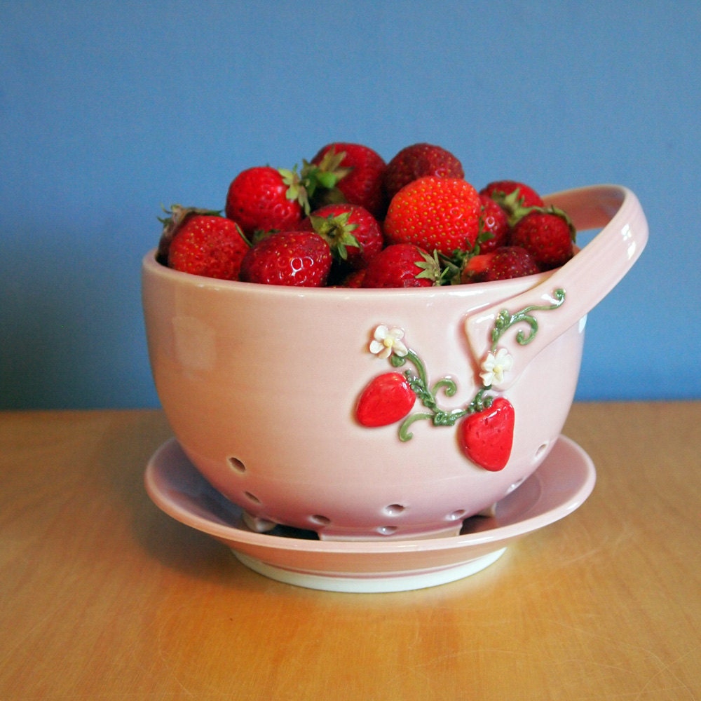 berry bowl in petal with strawberries