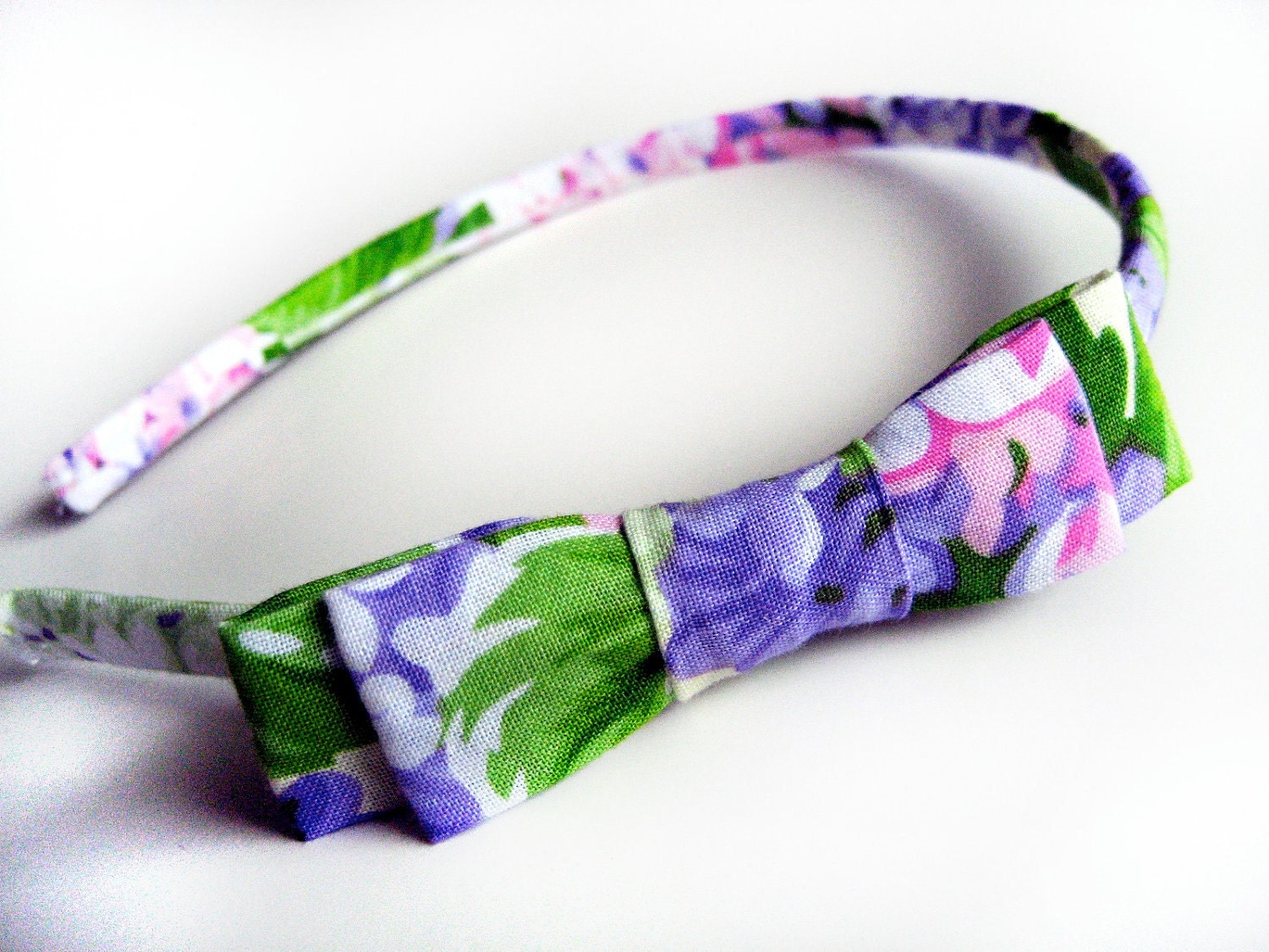 Classic Bow Headband in Spring Hydrangeas featuring an adjustable bow, purple pink hair flower headband