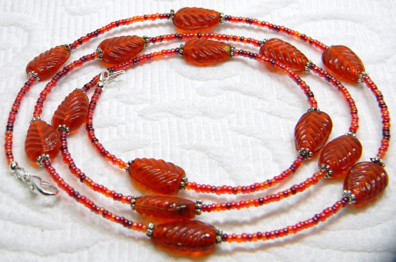 Opera Length Burnt Orange Glass Leaf, Seed Bead and Silver Necklace