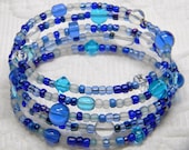 Shades of Blue and White Glass Oval Memory Wire Bracelet