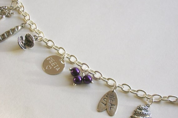 Hunger Games Peeta charm bracelet inspired by The Hunger Games movie and books with bread nightlock berries real not charms