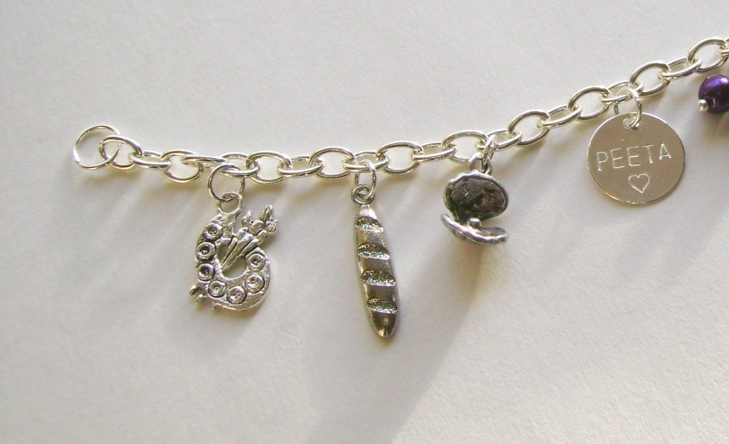 Hunger Games Peeta charm bracelet inspired by The Hunger Games movie and books with bread nightlock berries real not charms