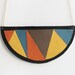Leather necklace in half moon shape with triangle pattern - multicolored & black