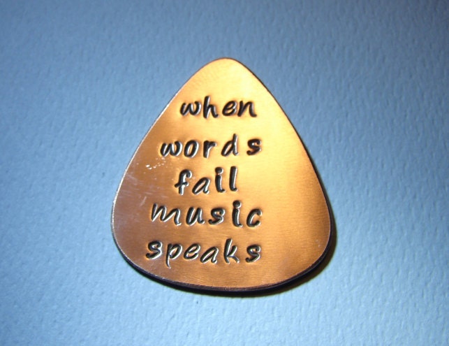 Copper Guitar Pick Handmade and Stamped with When Words Fail Music Speaks