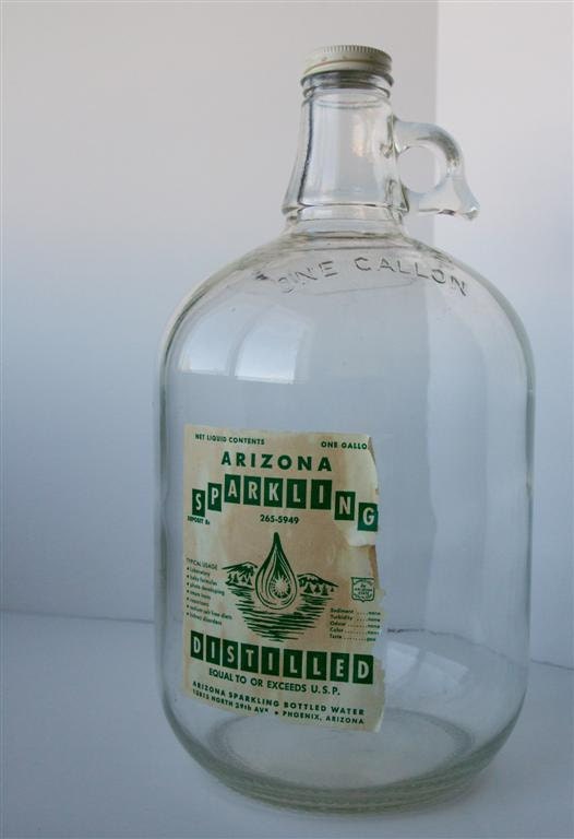 distilled water in glass jug 