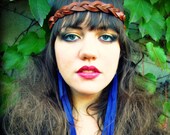 magic braided leather headband.  available in dark or light brown.  fits any size head.