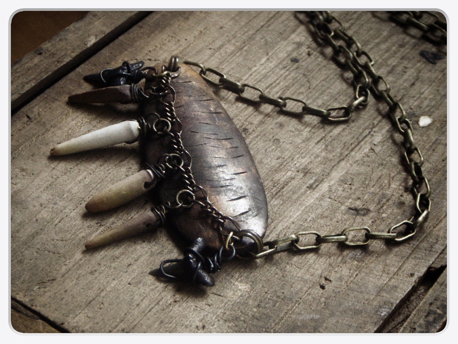 Dwellings of the Sea.  Antique fishing spinner, sand shark teeth, and  sea urchin spine  necklace