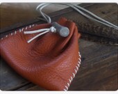 Hakan. Fire Orange Soft deer Leather Medicine Bag and Deer antler button. Handmade Rustic pouch By Gray Wolf's Mother