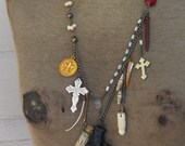 Murder on the Bayou. Priestess Marie Laveau.  Alligator tooth, Vintage gun, snake - turtle bones, snakeskin bottle, crosses art asemblage
