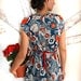 A line floral cotton asymmetrical mini dress with pockets Small in stock