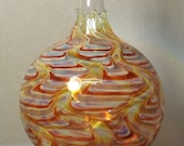 Blown glass ornament red Fire Ball by Fireworx Glass