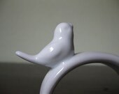 Four Porcelain Napkin Holders/Rings