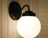 Tina Isle. Moon SCONCE In Oiled Bronze