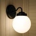 Tina Isle. Moon SCONCE In Oiled Bronze