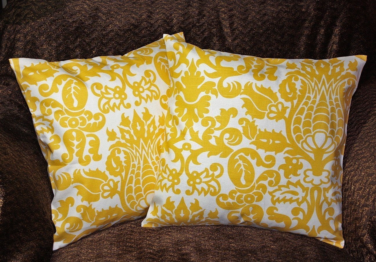 FREE U.S. SHIPPING - Set of Two 24x24 inch Designer Pillow Covers - Linen Appearance Corn Yellow on a White Background.