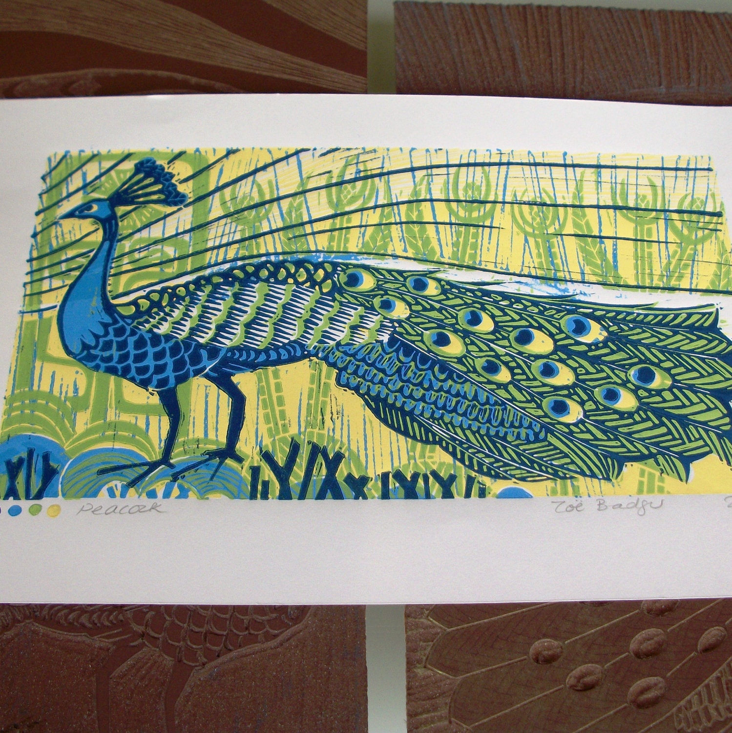 Peacock linocut print.