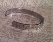 I solemnly swear that I am up to no good. Harry Potter Hand Stamped Cuff Bracelet
