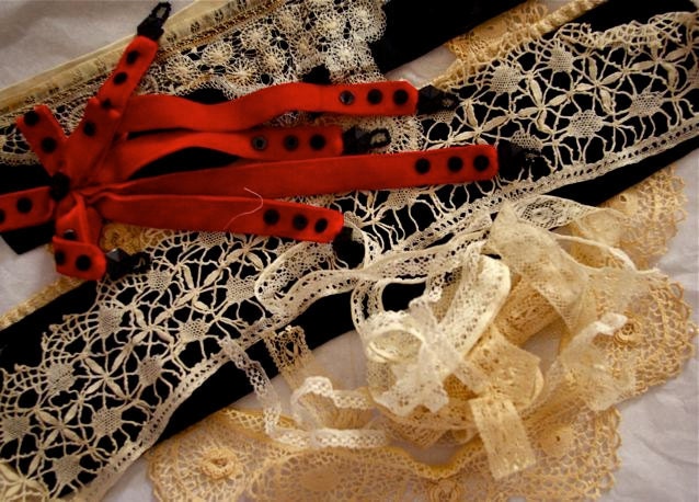 Edwardian lace and velvet collars, yardage, and velvet hat ornament