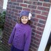 Purple Hat with a big white  flower
