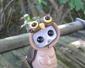 Robot in an owl costume