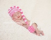 Pink and white elf hat with Pom Pom