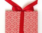 Accordion photo album red white graphic wax batik pattern