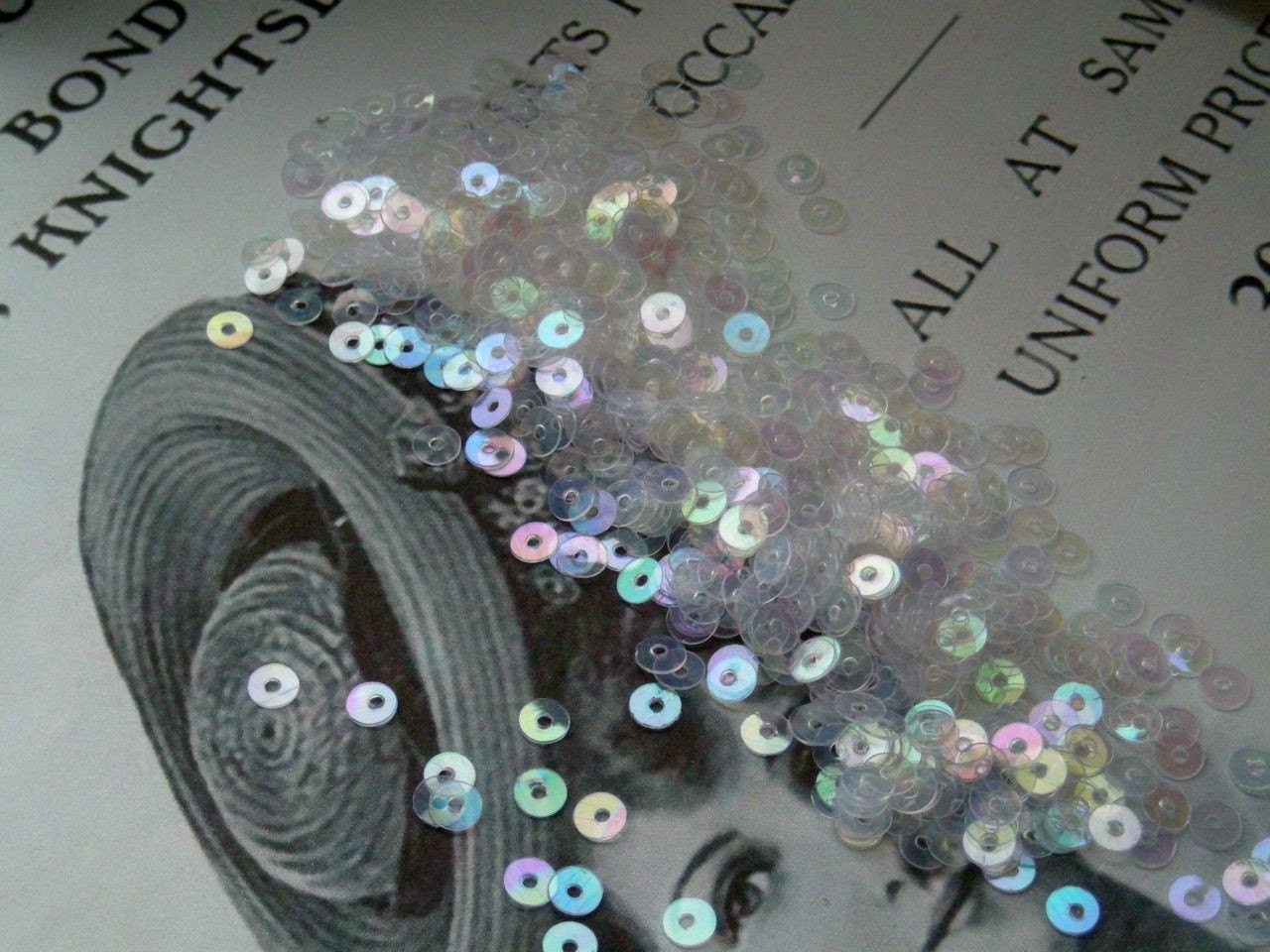 sequins, clear, rainbow finish (AB), 4mm