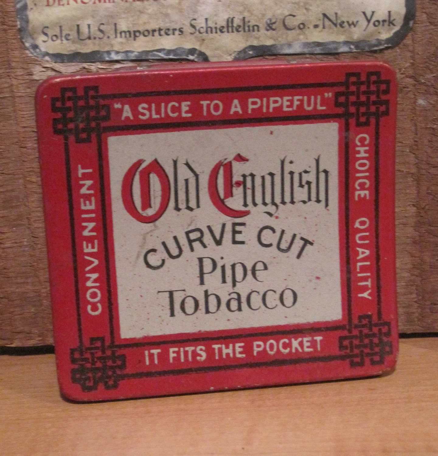 vintage old english curve cut pipe tobacco tin